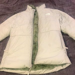 This is a name brand coat and is reversible good quality